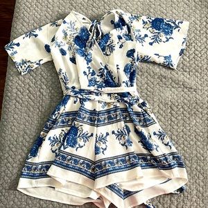 White and blue mixed pattern romper size S